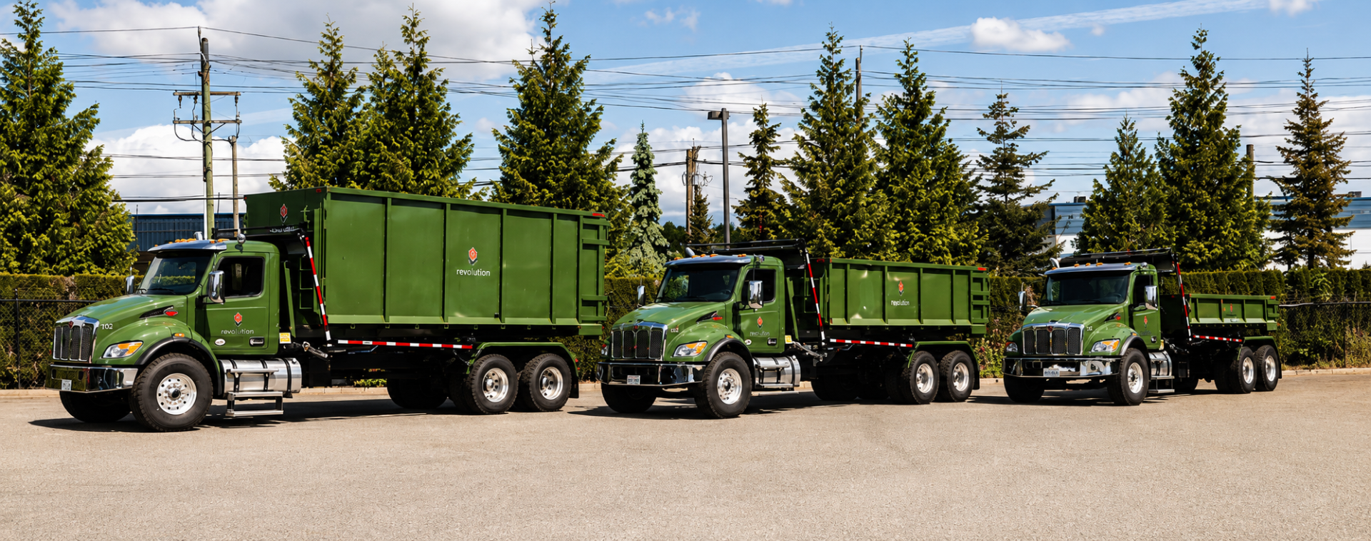 roll-off bins on the back of trucks