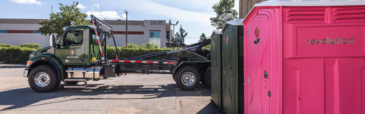 portable toilets being delivered to site